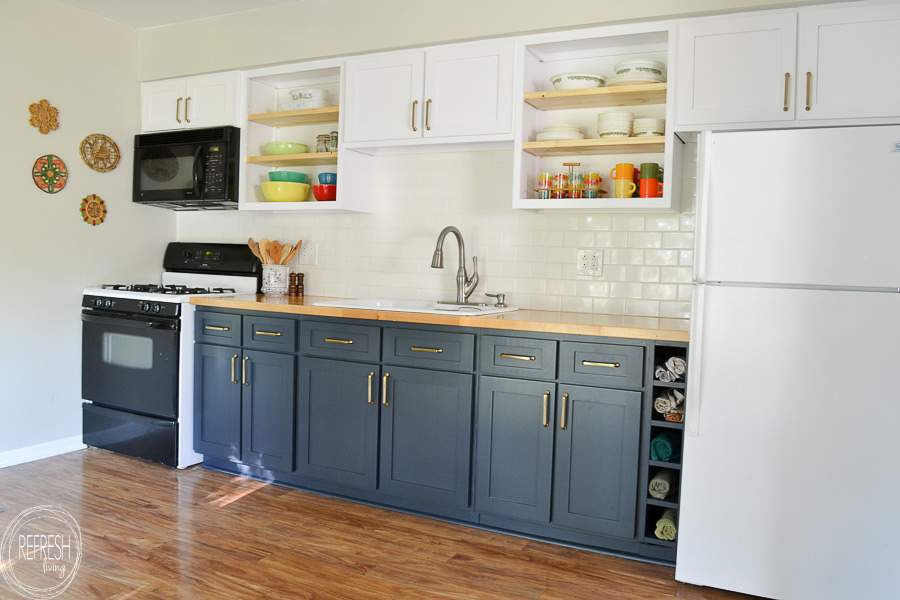 dark blue and white kitchen with new doors to reface kitchen cabinets 