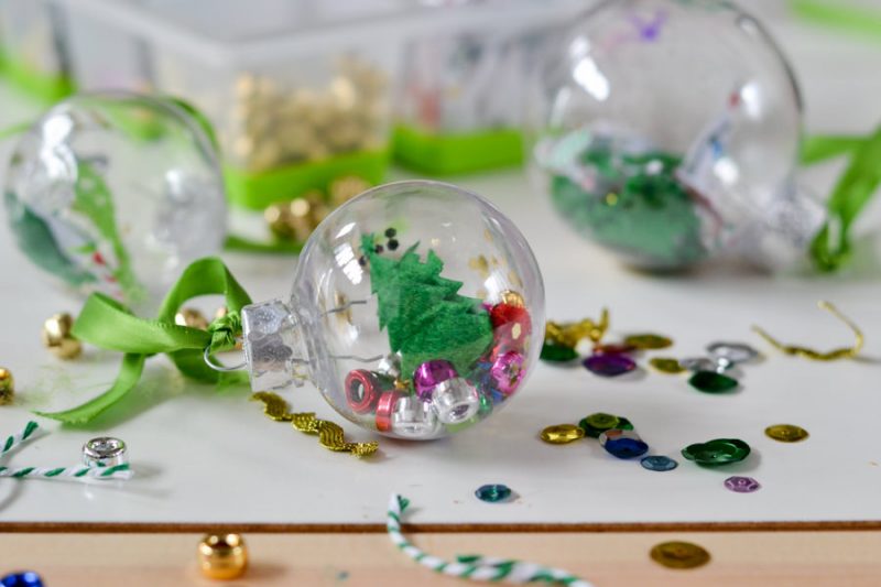 DIY ornaments for kids at a classroom party filled with small items