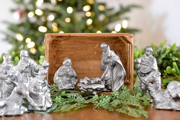 DIY nativity scene from thrift store ceramic figures with a antique mirror finish