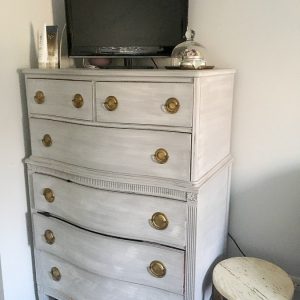 Boring master bedroom gets a makeover for less than $100. It's now a colorful vintage modern space.