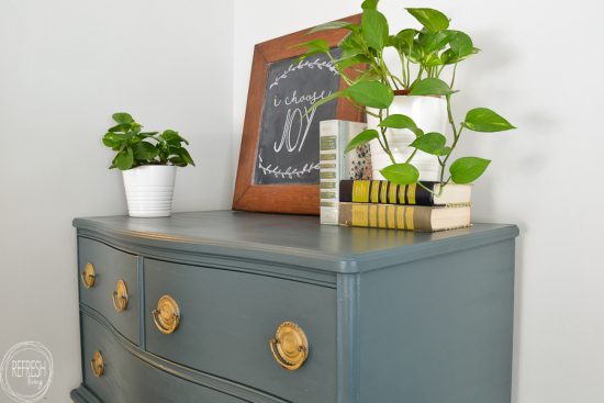 Use a paint sample from the any home improvement store to make your own DIY chalk paint to easily paint furniture in any color! Modern dark green dresser painted with DIY chalk paint.