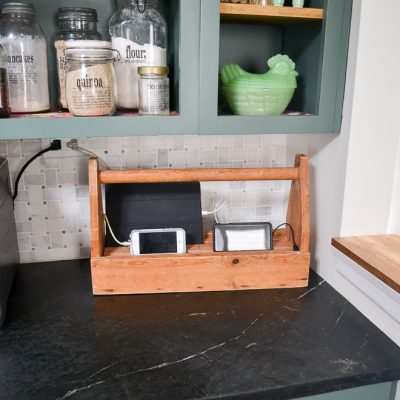 Love this idea to use an old tool crate and turn it into a charging station. I see these vintage caddies in the basements of estate sales all the time!