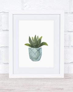 This free watercolor printable potted plant is adorable and the perfect way to add a touch of spring without spending a lot of money.