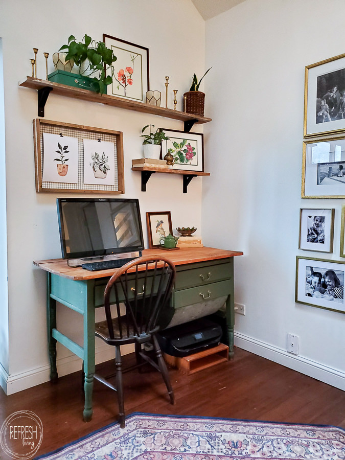 Open shelves in office with green desk with plants and watercolor floral prints and free printable plants