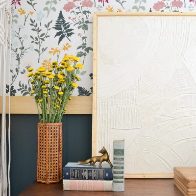 Such an easy way to make large scale art for cheap using canvas artwork and drywall mud. Video tutorial and step by step process for how to make a DIY modern art on canvas