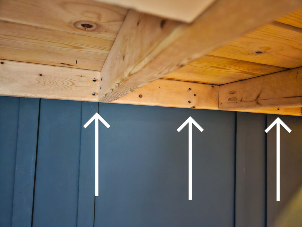 how to attach loft bed to wall using pre drilled holes in the places where there are studs in the wall