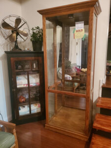 Display curio cabinet used to make an indoor greenhouse