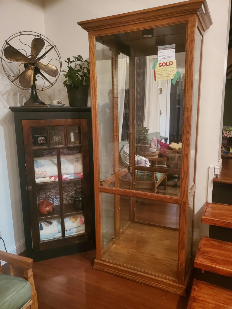 use a curio cabinet instead of an IKEA greenhouse to make an indoor greenhouse