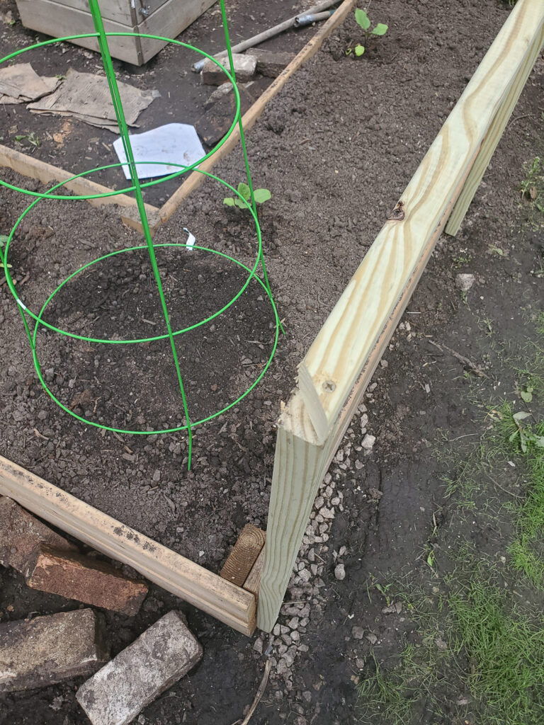 install an attached fence to raised garden beds