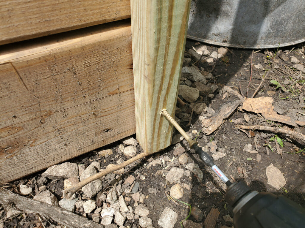 install an attached fence to raised garden beds