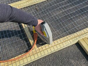 attaching the mesh to panels for a catio to keep cats safe