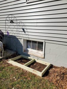 base for cat patio outside of a basement window