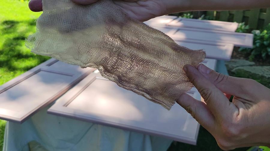 how to remove sanding dust between coats of paint