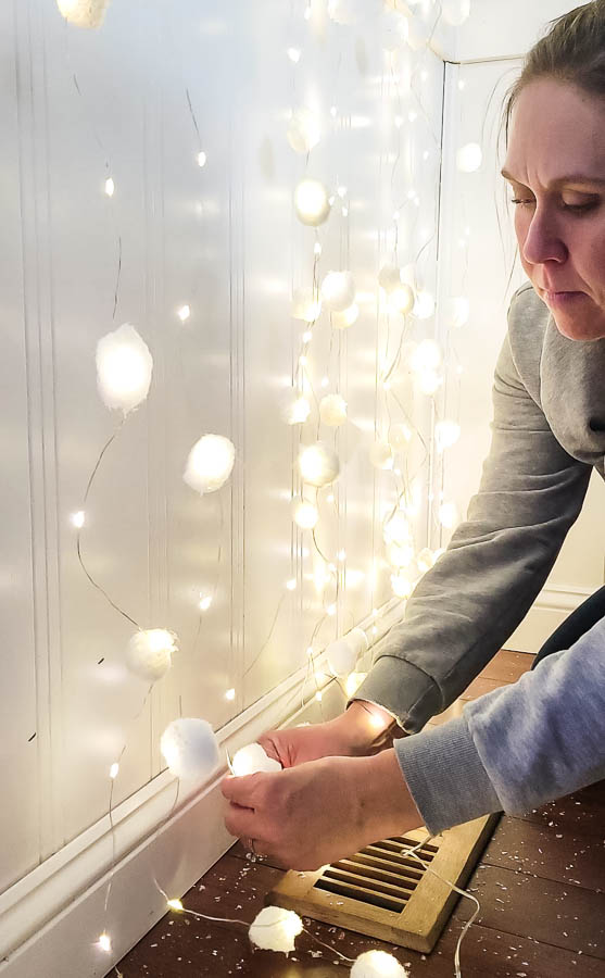 DIY snowball lighting made from curtain lights and cotton balls