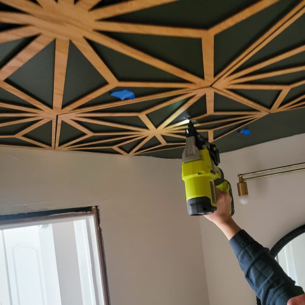 use a brad nailer to attach wood fretwork panels 